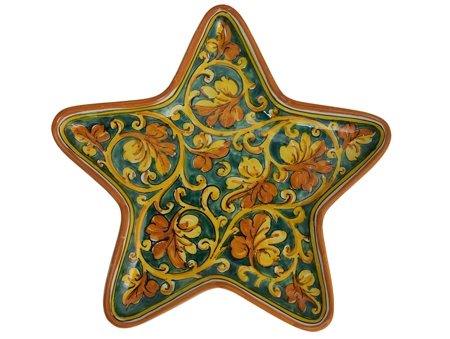 Star tray with spiral vine leaf decoration on green background
